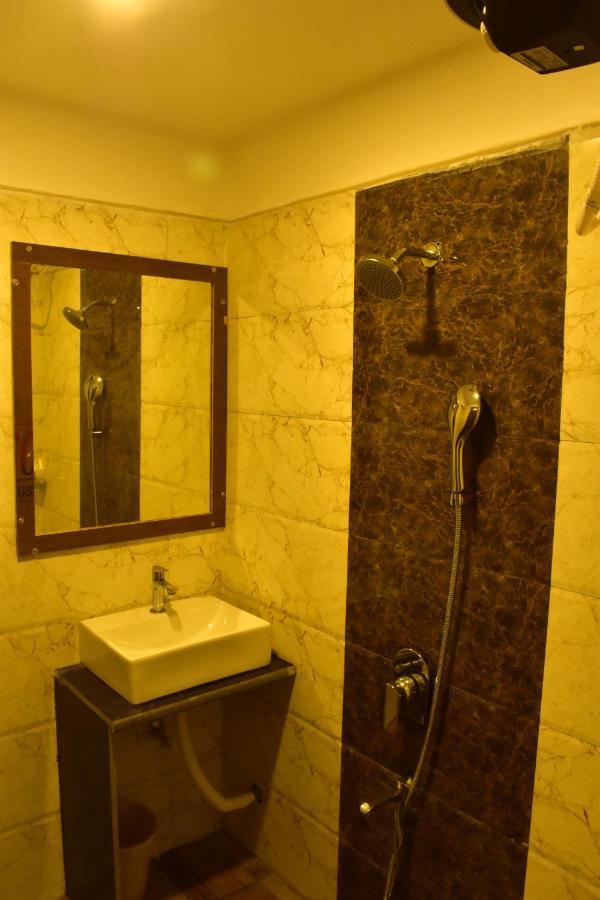 Hotel Ridley International ดีกา ภายนอก รูปภาพ