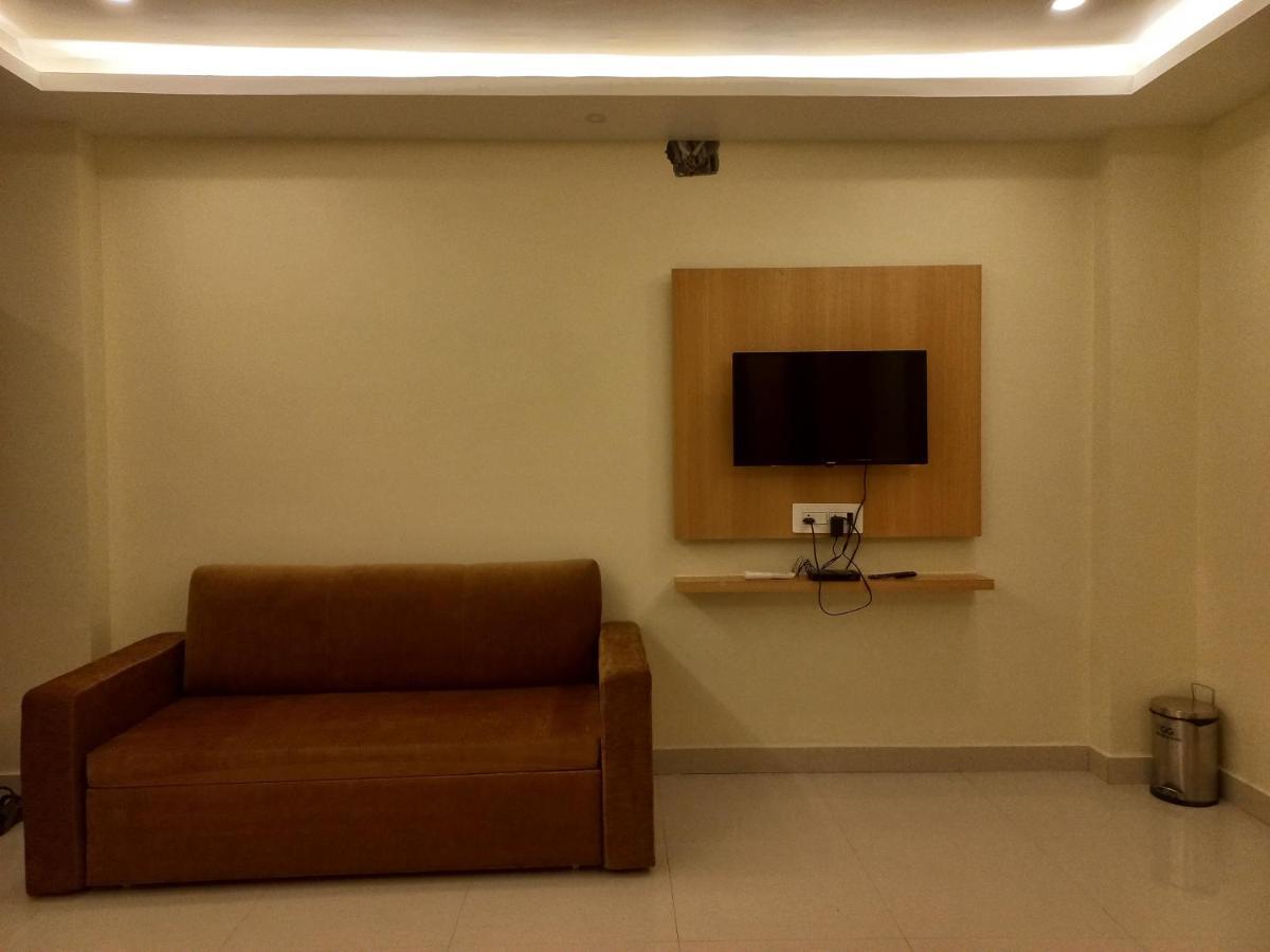 Hotel Ridley International ดีกา ภายนอก รูปภาพ