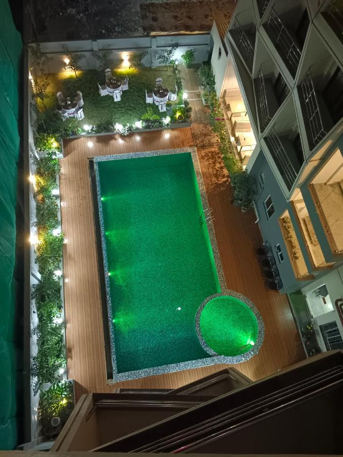 Hotel Ridley International ดีกา ภายนอก รูปภาพ